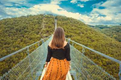woman walking on bridge